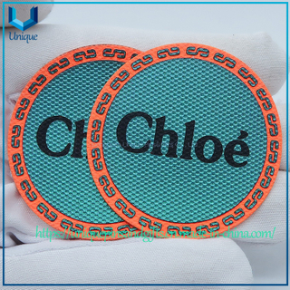 Personalizar el diseño del logotipo Fondo de textura de tela Parche de TPU, Parche de TPU para planchar uniforme escolar, Parche de PVC de goma con plancha para camiseta deportiva