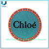 Personalizar el diseño del logotipo Fondo de textura de tela Parche de TPU, Parche de TPU para planchar uniforme escolar, Parche de PVC de goma con plancha para camiseta deportiva
