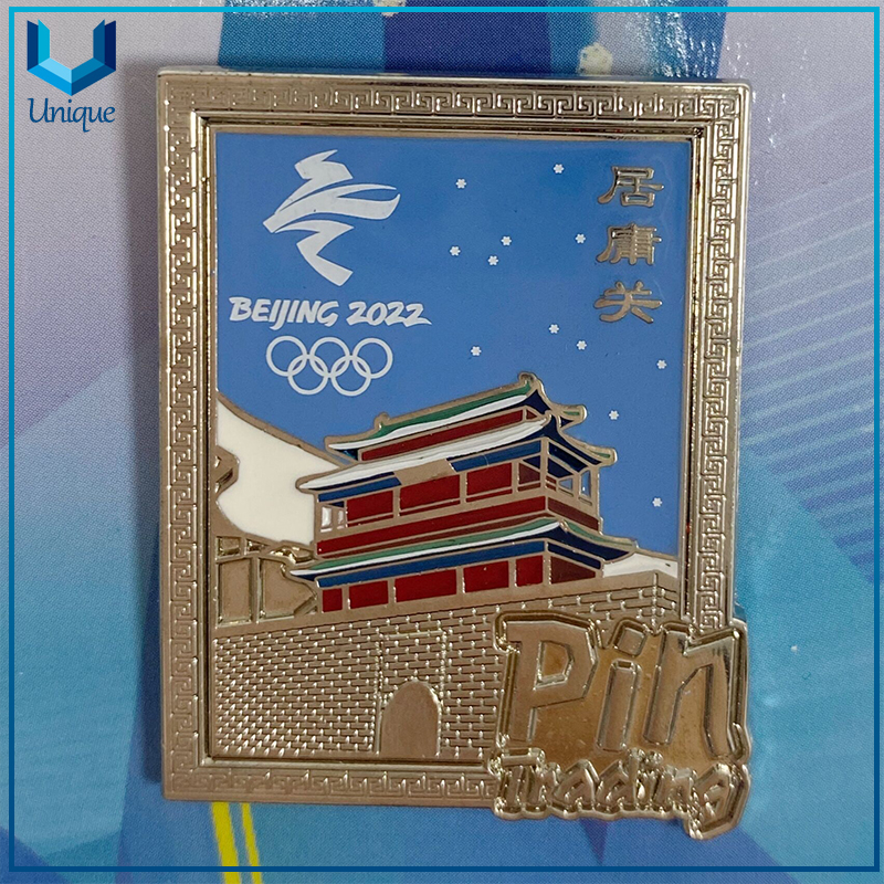 Pin de solapa de juego olímpico de invierno de oro/níquel de alta calidad de diseño personalizado