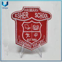 Hierro de diseño de moda barato en insignia al por mayor de alta calidad Insignia personalizada de alta frecuencia, parche termofusible de PVC de alta calidad y bajo precio para prendas de vestir, sello bordado