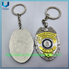 Diseño personalizado Relieve 3D Gold /plata Forma ovalada de dos colores Medalla de recuerdo de electroplacas de dos colores Die de llavero de llaves de la policía de aleación de zinc fundido