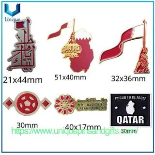 Venta al por mayor de banderas de mapas nacionales de Qatar, insignias de emblemas nacionales, pegatinas para teléfonos móviles, insignias de metal en el pecho para regalos conmemorativos de turismo de festivales