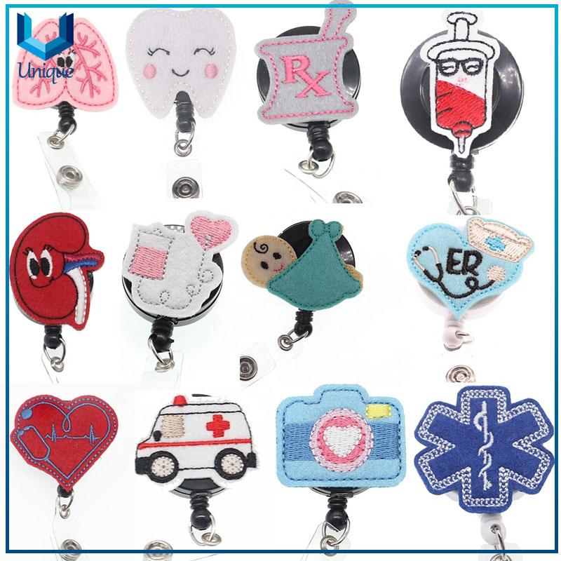 Reel de insignia de la identificación de la enfermera retráctil personalizada con el clip de cocodrilo para los accesorios de la enfermera