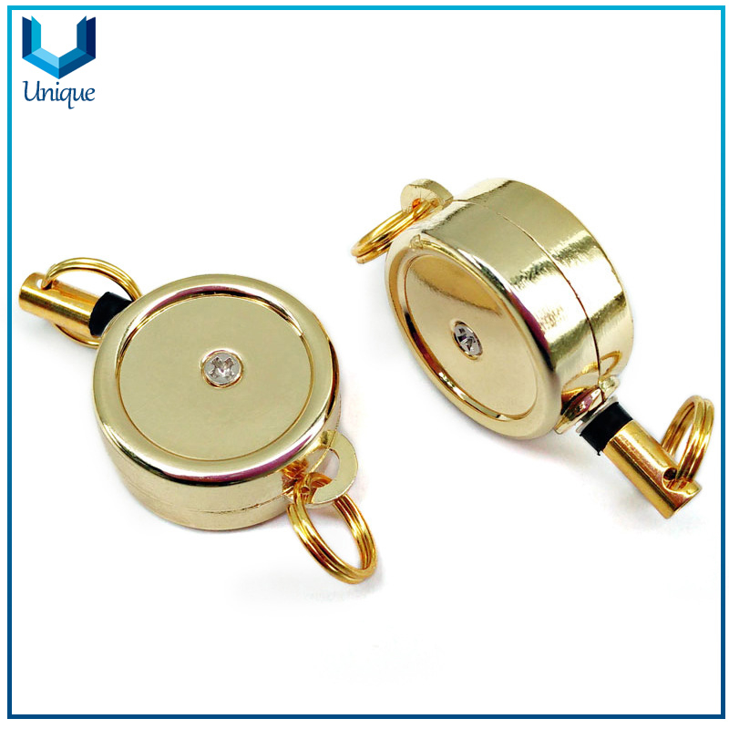 Carrete de la insignia de metal de alta calidad con llavero, personalice el logotipo de impresión con el carrete de la insignia de epoxi para la oficina de papelería