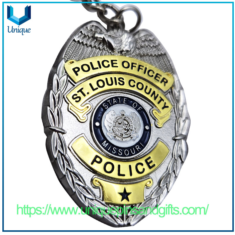 Diseño personalizado Relieve 3D Gold /plata Forma ovalada de dos colores Medalla de recuerdo de electroplacas de dos colores Die de llavero de llaves de la policía de aleación de zinc fundido