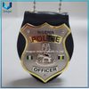 Insignia de metal de la policía de Nigeria con revestimiento de dos tonos en oro 3D y níquel de diseño personalizado de alta calidad con soporte de cuero de vaca con cadena de bolas y clip para cinturón