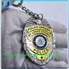 Diseño personalizado Relieve 3D Gold /plata Forma ovalada de dos colores Medalla de recuerdo de electroplacas de dos colores Die de llavero de llaves de la policía de aleación de zinc fundido