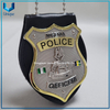 Insignia de metal de la policía de Nigeria con revestimiento de dos tonos en oro 3D y níquel de diseño personalizado de alta calidad con soporte de cuero de vaca con cadena de bolas y clip para cinturón