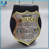 Insignia de metal de la policía de Nigeria con revestimiento de dos tonos en oro 3D y níquel de diseño personalizado de alta calidad con soporte de cuero de vaca con cadena de bolas y clip para cinturón